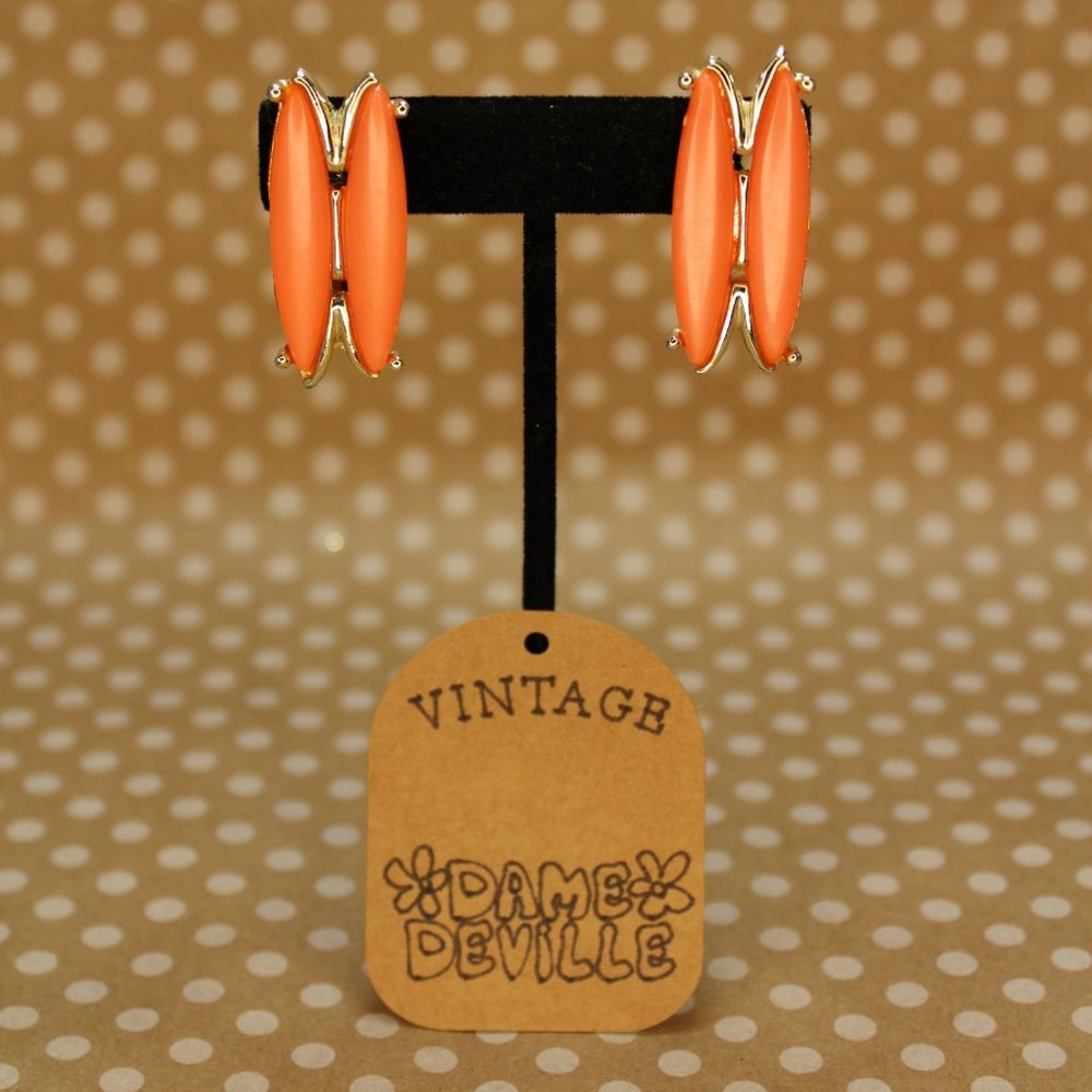 True Vintage Salmon Orange Oval on Gold toned Metal Clip Ons